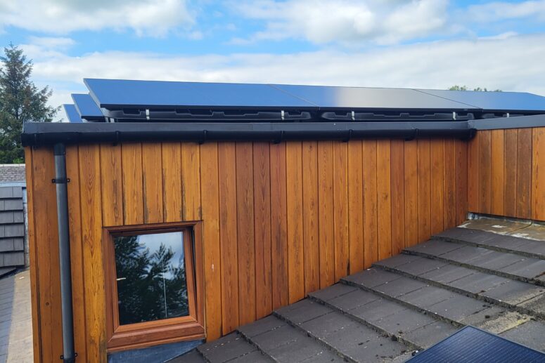 Complete Solar Panels Installation designed for a property with a flat roof, featuring Battery Storage and a Hybrid Inverter.